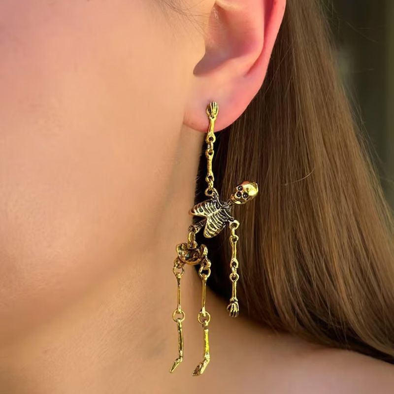 Boucles d’Oreilles Longues Pendantes en Forme de Squelette Articulé