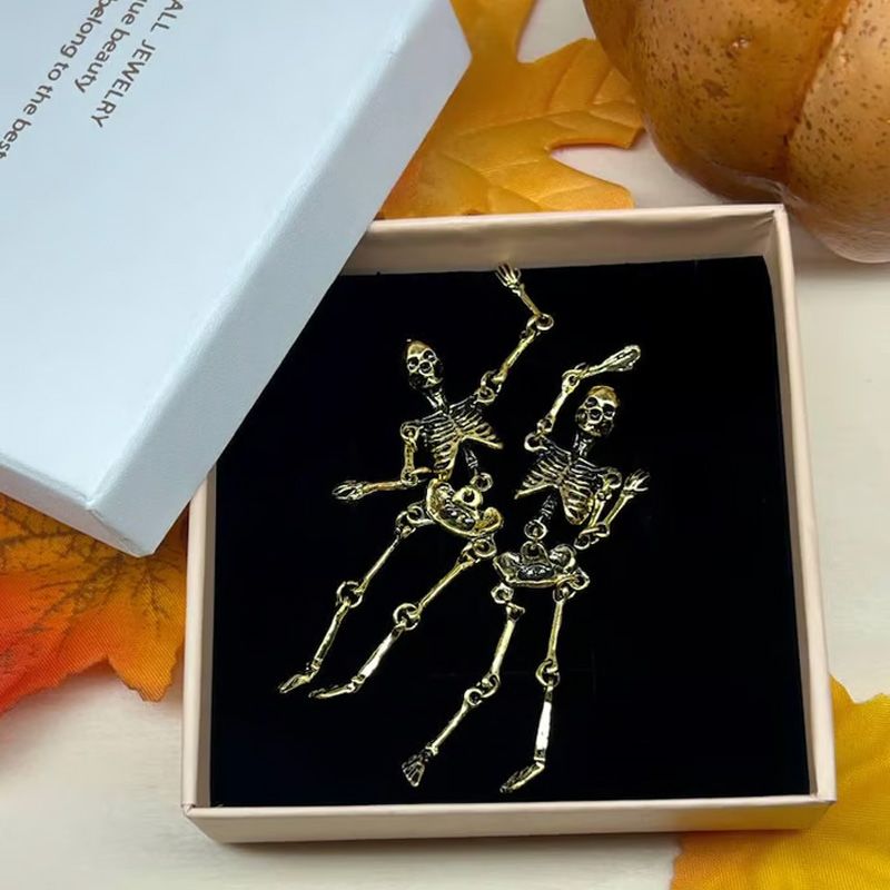 Boucles d’Oreilles Longues Pendantes en Forme de Squelette Articulé