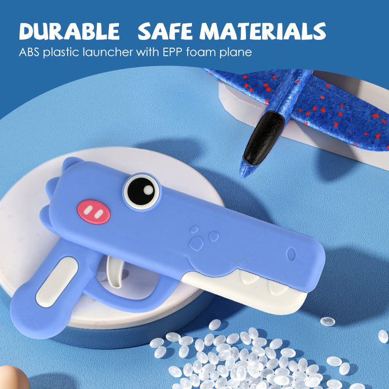 Jouet lance-avions en forme de dinosaure pour enfants