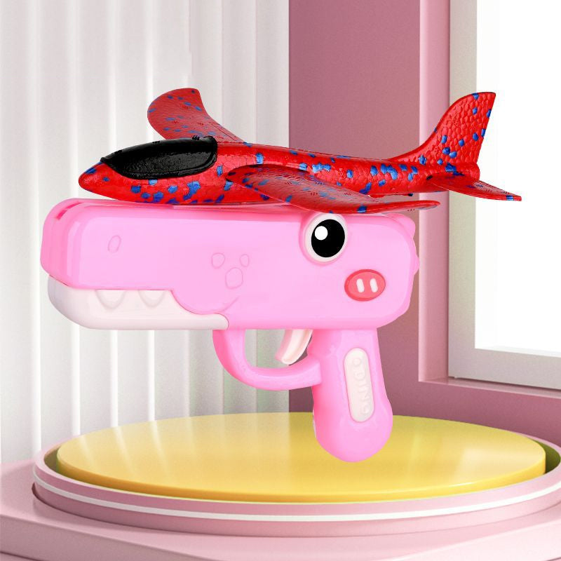 Jouet lance-avions en forme de dinosaure pour enfants